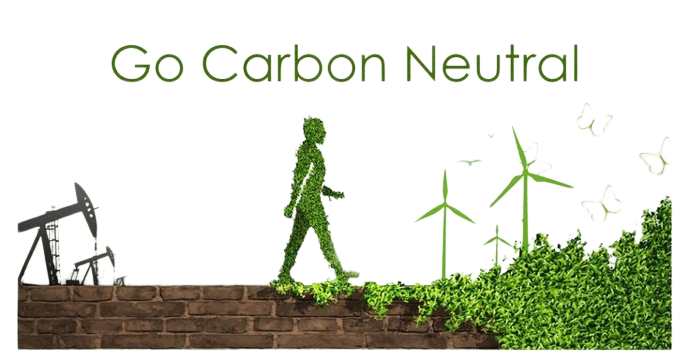 Person made of leaves walks on a brick wall with text "Go Carbon Neutral" promoting eco-friendly practices. Biodiesel, a renewable fuel made from plants, is a possible alternative to diesel fuel.